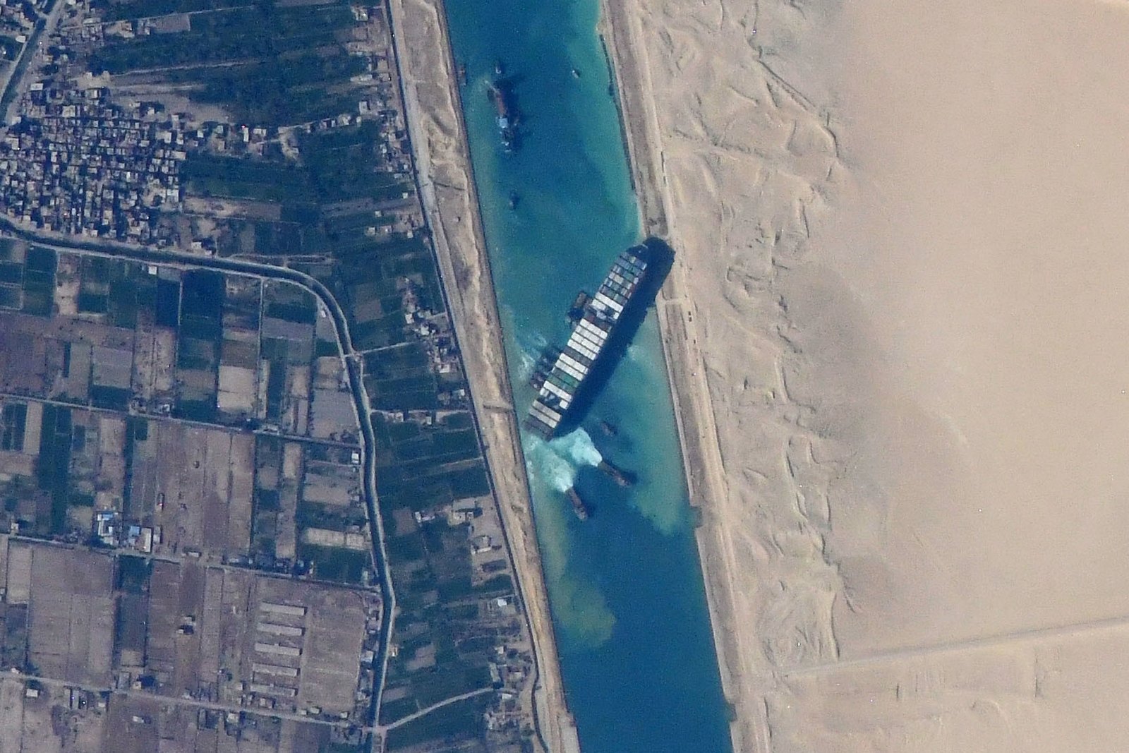 The container ship Ever Given stuck in the Suez Canal in Egypt, viewed from the International Space Station
