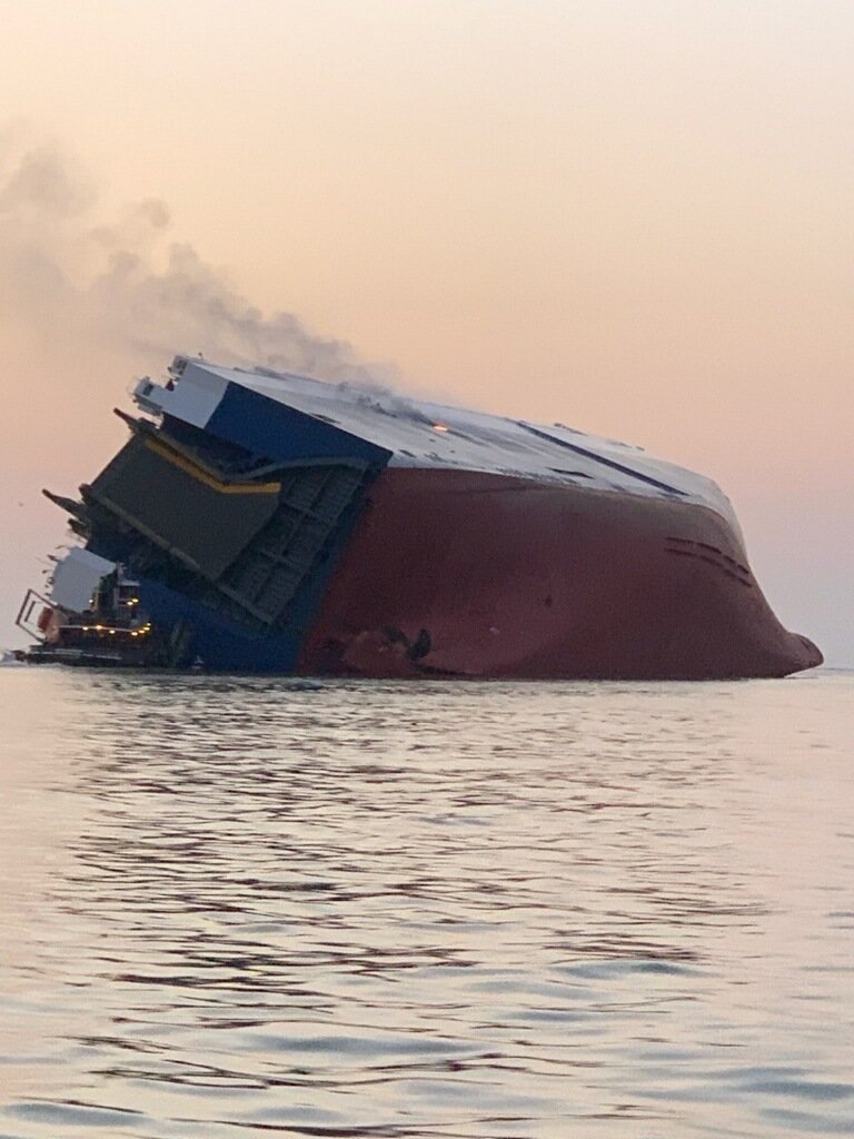 Coast Guard crews and port partners respond to a disabled cargo vessel with a fire on board September 8, 2019, in St. Simons Sound, Georgia. At approximately 2 a.m., Coast Guard Sector Charleston watch standers were notified of the M/V Golden Ray , a 656′ vehicle carrier, listing heavily in the St. Simons Sound with a total of 24 people on board; including 23 crew members and 1 pilot.