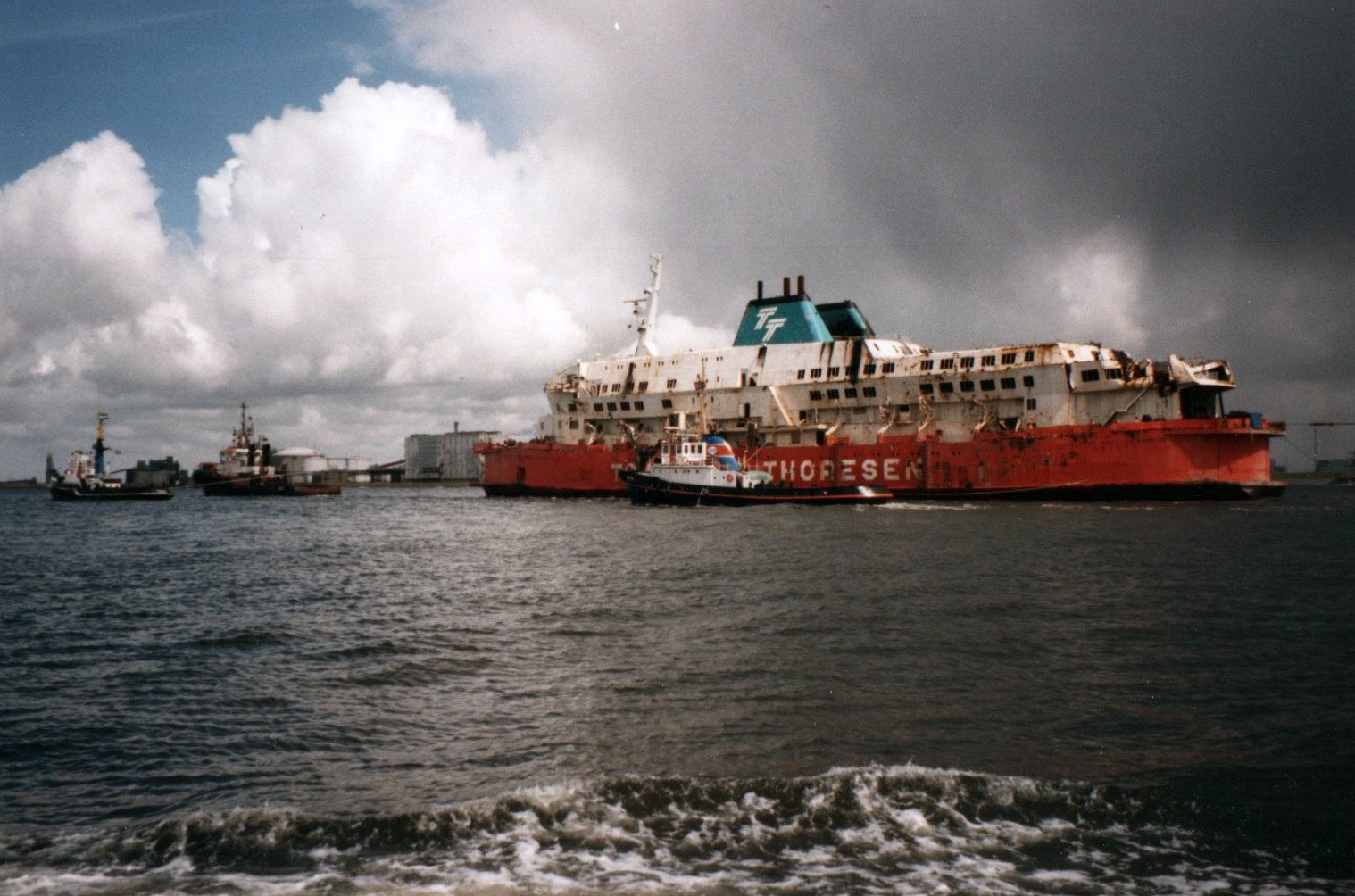 MS Herald of Free Enterprise being towed into the harbour of Vlissingen, Netherlands after salvage.