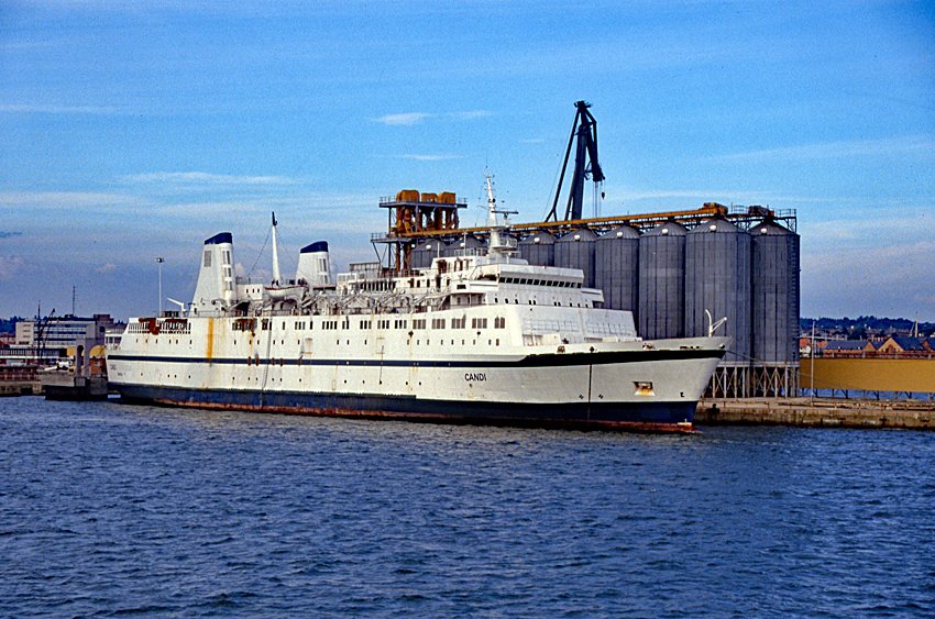 Candi , ex Scandinavian Star , laid up in Southampton after fire. Scanned from a Fujichrome 35mm slide. Information about the vessel may be found at IMO 7048219 . A ship can change name and flag state through time, but the IMO number remains the same through the hull's entire lifetime. As a result, it can be useful to identify a ship by using the IMO number.